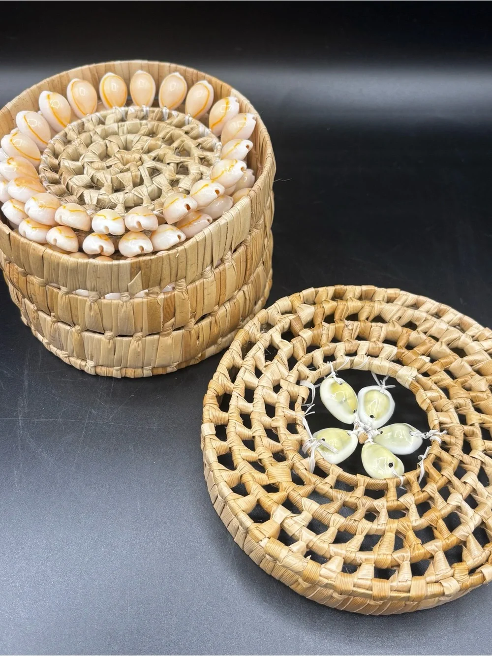 Vintage Coaster Set Hand Woven Straw Palm Basket and Six Cowrie Shell Coasters